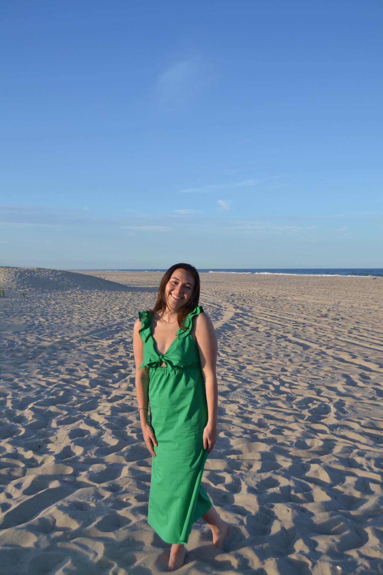 Maggie, founder of The Shore Social, on the beach at Long Beach Island